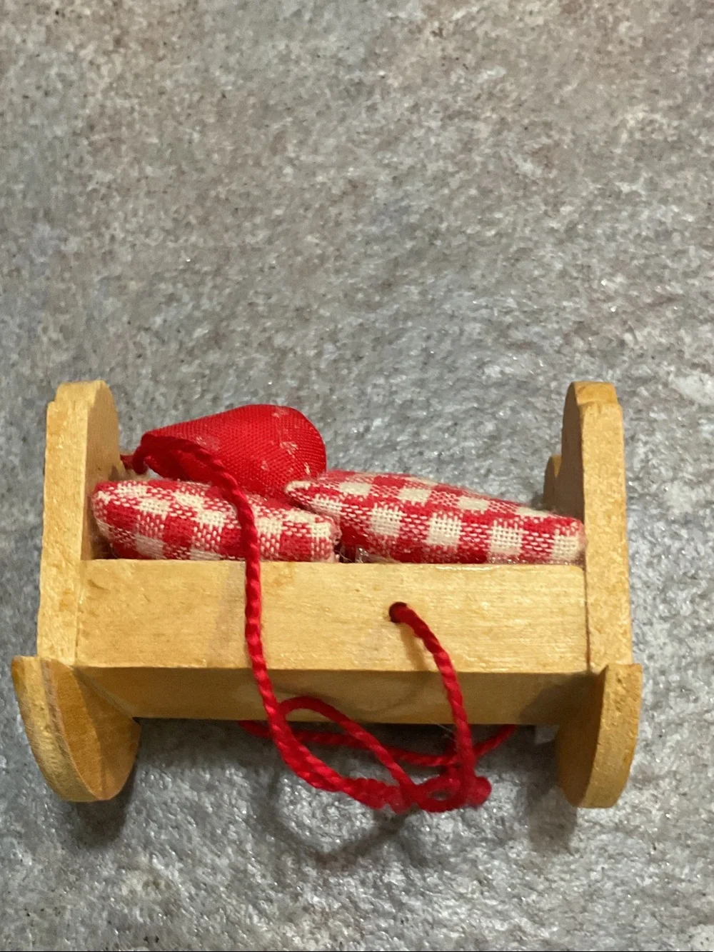Wooden Holiday Cradle Ornament with Red Gingham Bedding made in Germany